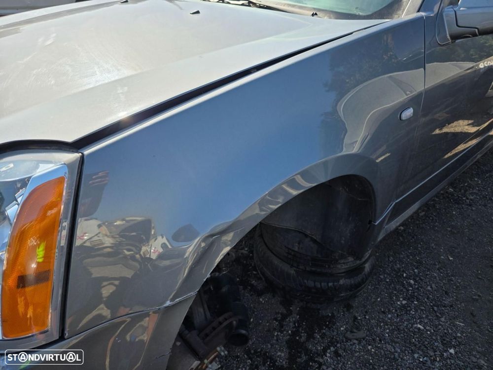 GUARDA-LAMAS FRENTE ESQUERDO CADILLAC SRX - 1