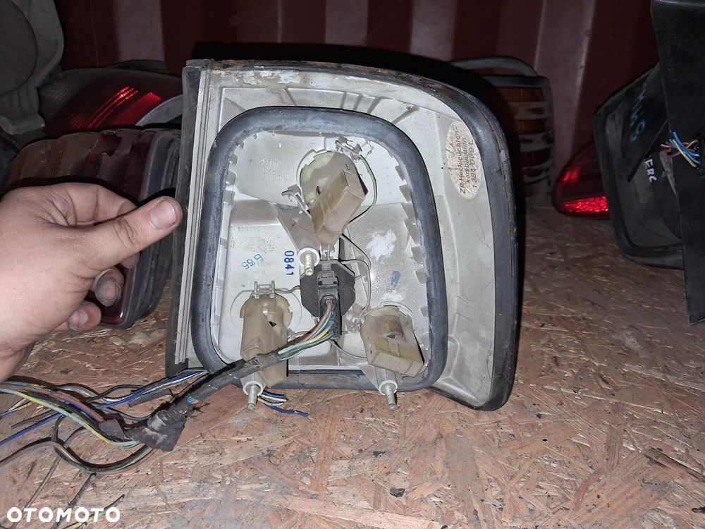 LAMPA TYLNA LEWA BMW E34 - 2