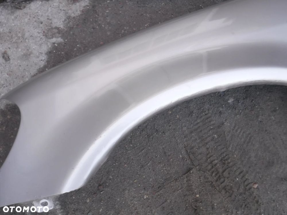 Mercedes ML FL Lift blotnik lewy  bez rdzy 693 C693 - 5