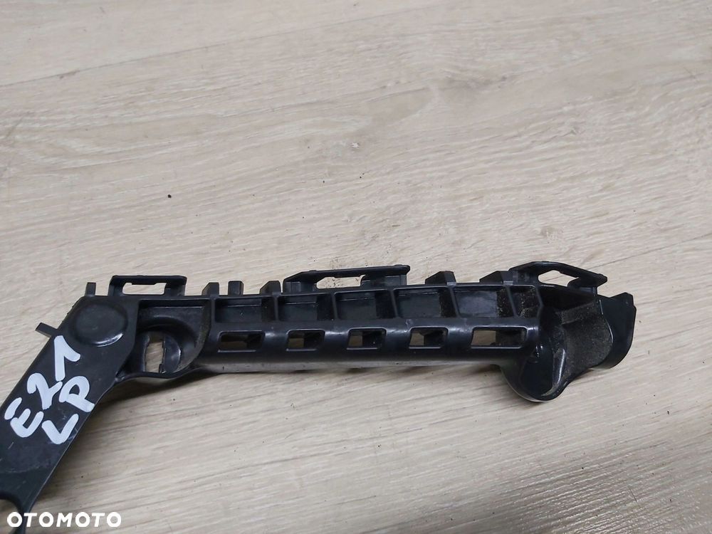 TOYOTA Corolla E21 ślizg zderzaka lewy przód mocowanie 52116-02470 - 15