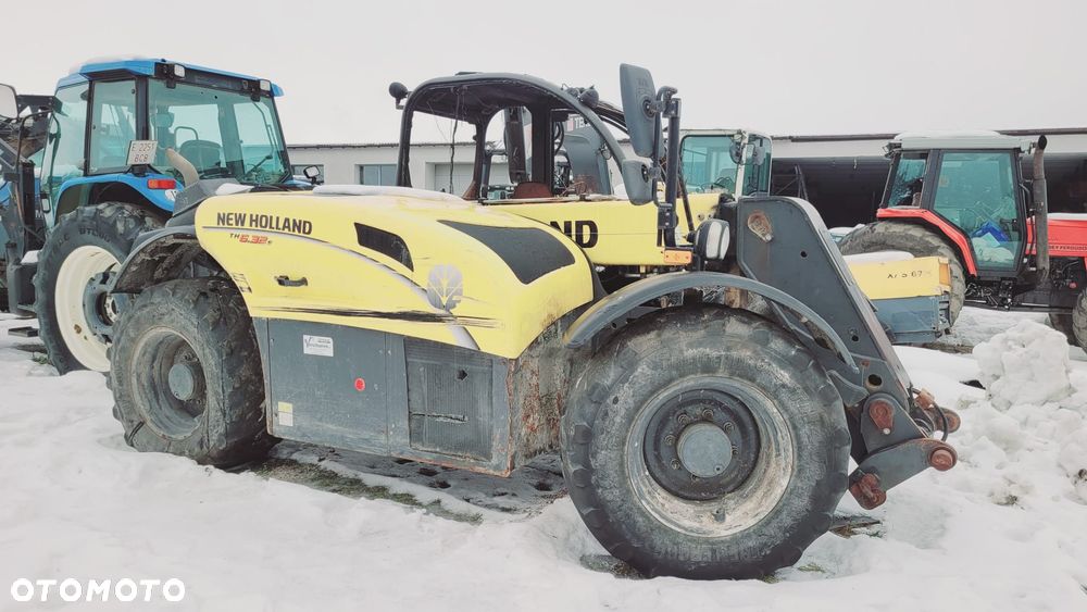 Spalona ładowarka New Holland TH 6.32 na części - 1