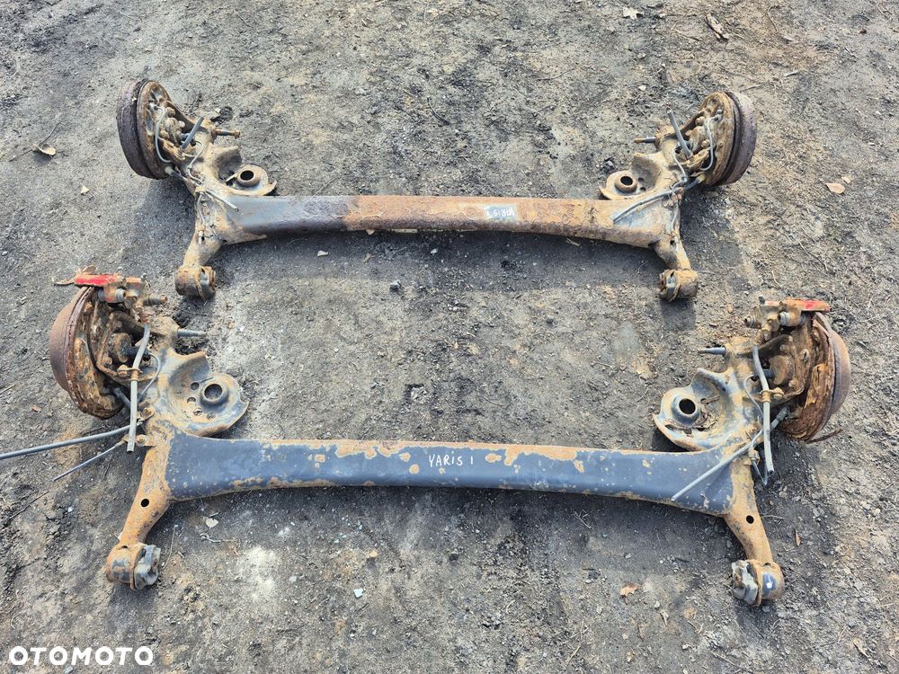 Belka zawieszenia tył toyota yaris I tarcza bęben