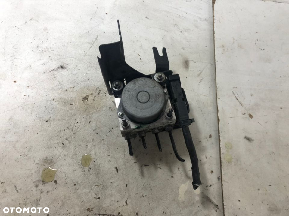 NOTE I E11 06R- POMPA HAMULCOWA ABS 476609U100 - 2