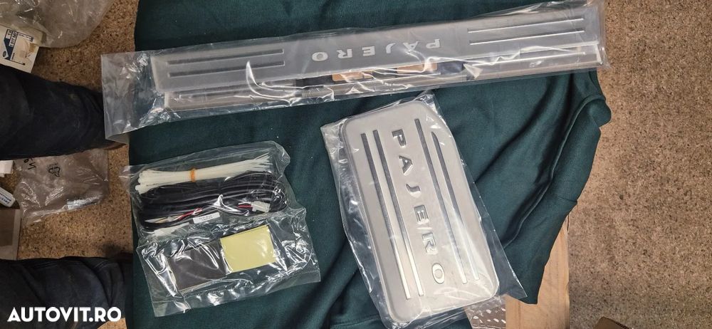 Set plăci prag iluminate NOI 2014-2019 Pajero Long V93 V98 cod MZ527518EX - 1