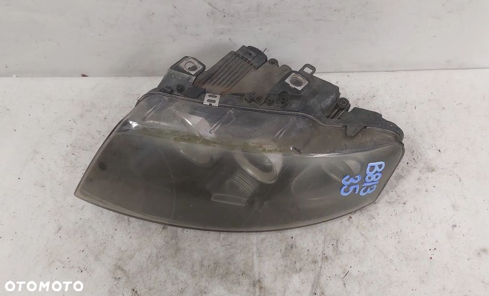 .  LAMPA PRZOD PRZEDNIA LEWA AUDI A6 C5 - 2
