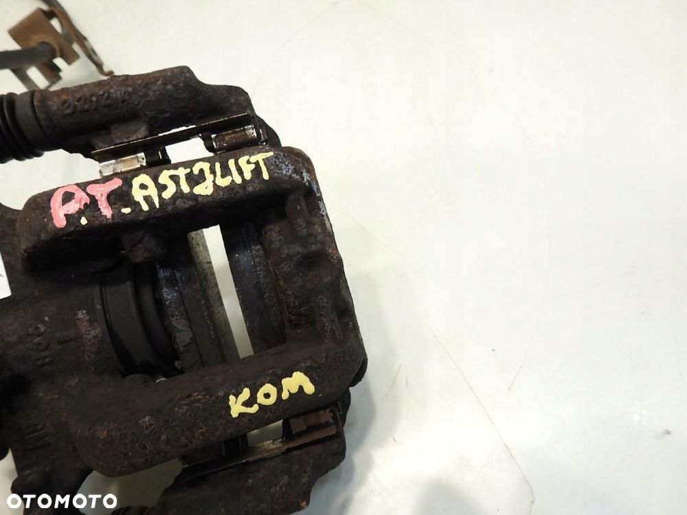 ZACISK HAMULCOWY PRAWY TYŁ OPEL ASTRA J LIFT KOMBI 1.7 CDTI - 2