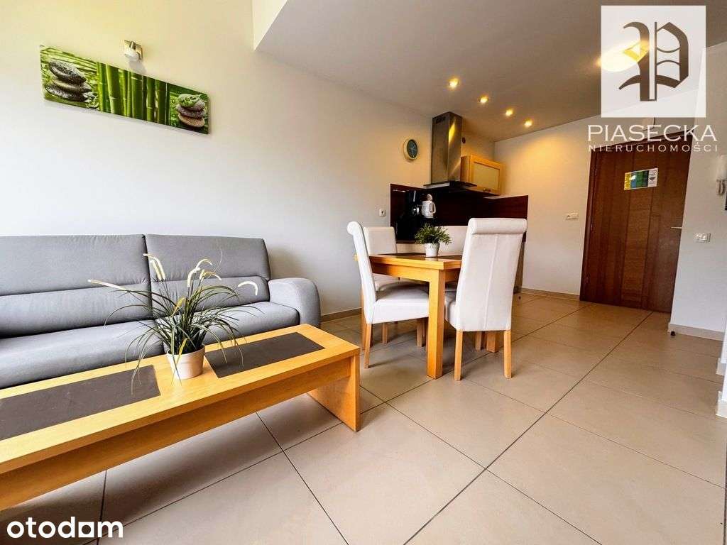 Apartament dwupoziomowy z balkonem i widokiem