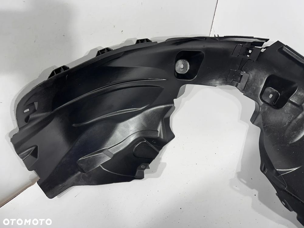 Nadkole przód L  Opel Corsa D  513765057 - 9