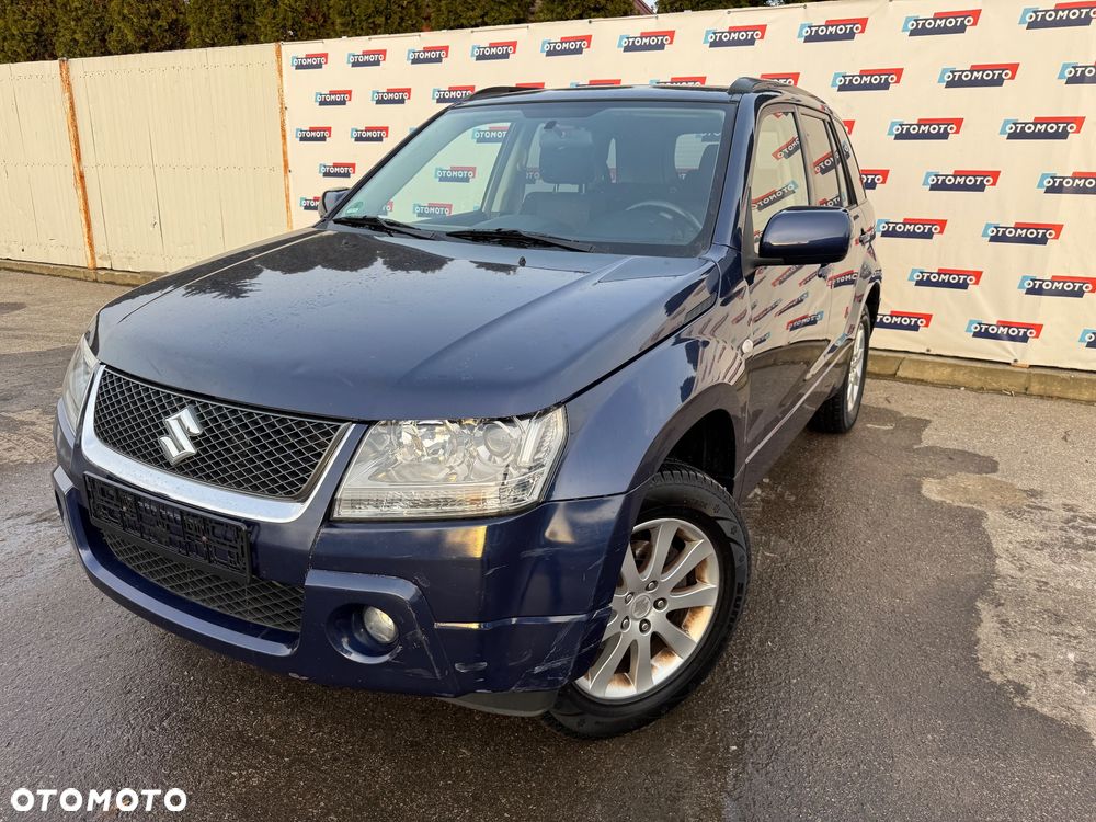 Suzuki Grand Vitara 2.0 Comfort + Family - 1