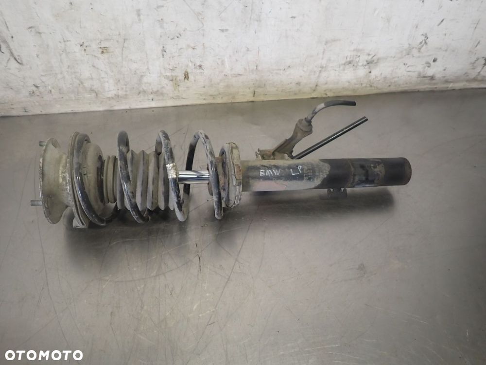 MCPERSON LEWY PRZEDNI BMW E87 - 2
