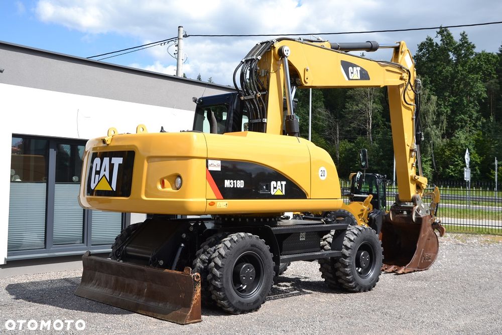 Caterpillar 318 D - 10