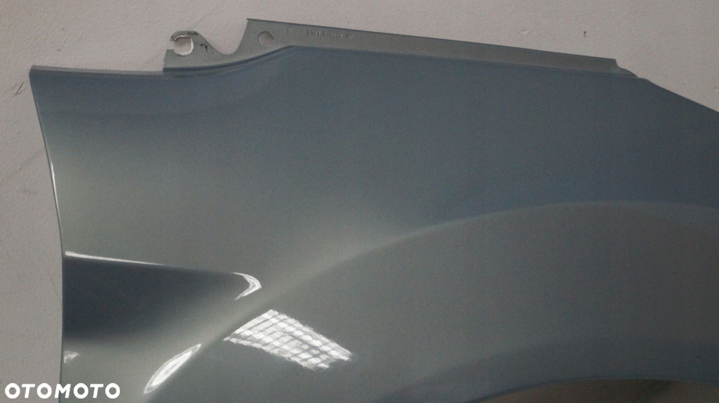 BŁOTNIK PRZEDNI PRAWY FORD FIESTA MK7 79 - 4
