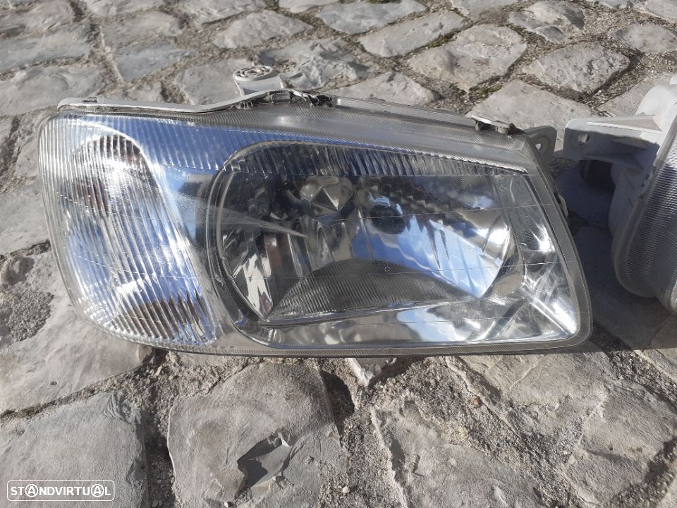 Guarda lamas hyundai accent ano 2002 - 12