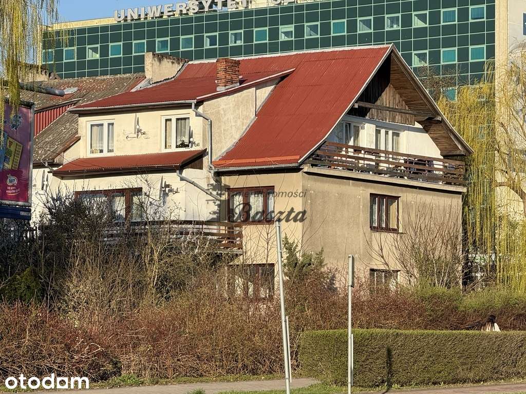 Dół domu z ogrodem - idealny na siedzibę firmy