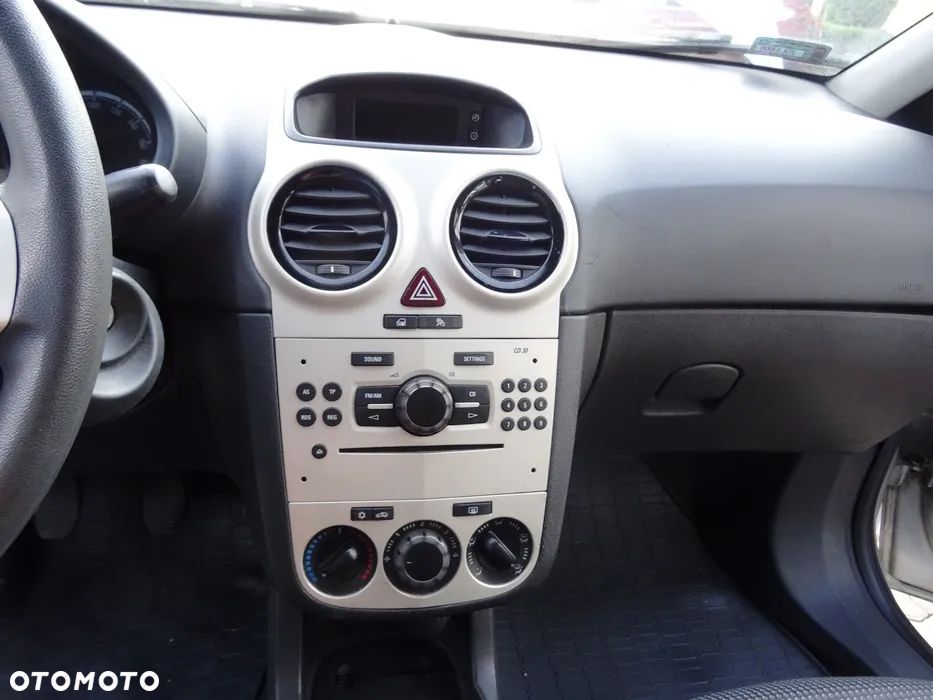 Opel Corsa 1.2 16V Enjoy - 23