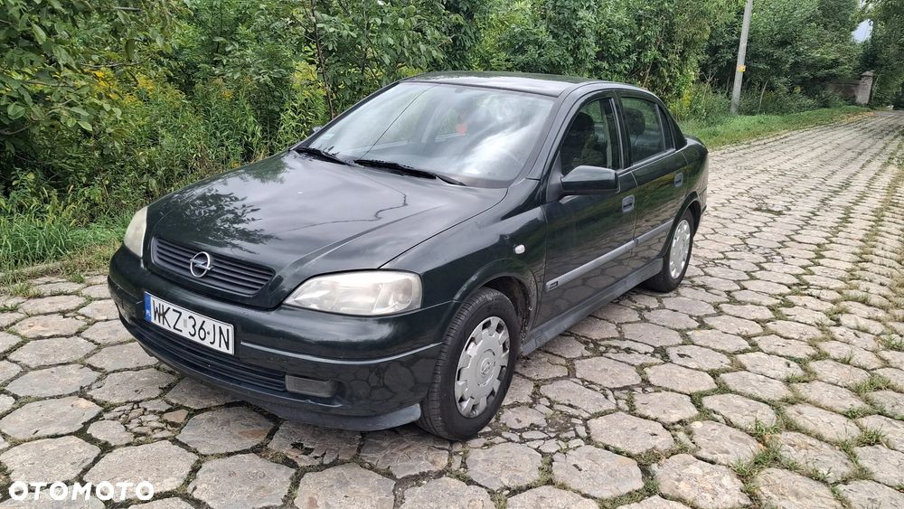 Na części Opel Astra G II SEDAN silnik 1.6 X16XEL Z16XE lakier Z380 skrzynia maska zderzak drzwi klapa szyba fotel kanapa lusterko lampa deska GWARANCJA !!! Przód Tył Zestaw Komplet Drzwi Klapa Zderzak Błotnik Maska Grill Atrapa Szyba Pas Lampa Lusterko Boczki Fotel Kanapa Kokpit Deska Rozdzielcza Przełącznik Włącznik Sterownik Przewody Wiązka Instalacja Moduł Komputer Czujnik Listwa Pompa Alternator Wtryski Głowica Rozrusznik Kompresor Sprzęgło Dwumas Silnik  Skrzynia ABS Klimatyzacji Paliwa Wspomagania Kolektor Turbina Przepustnica Zawór Chłodnica Koło Hak Belka Sanki Zawieszenie Mcpherson Półoś Amortyzator Wydech Tłumik Zacisk Most - 3