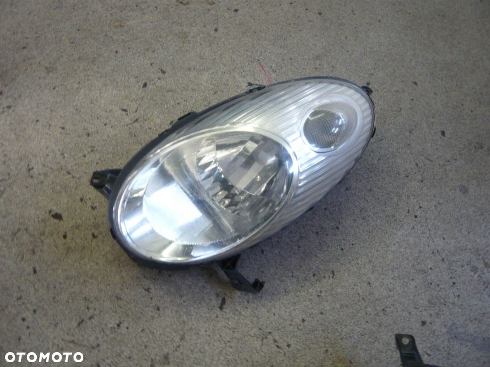 reflektor lampa lewa przód 08-215-1194l nissan micra k12 - 1