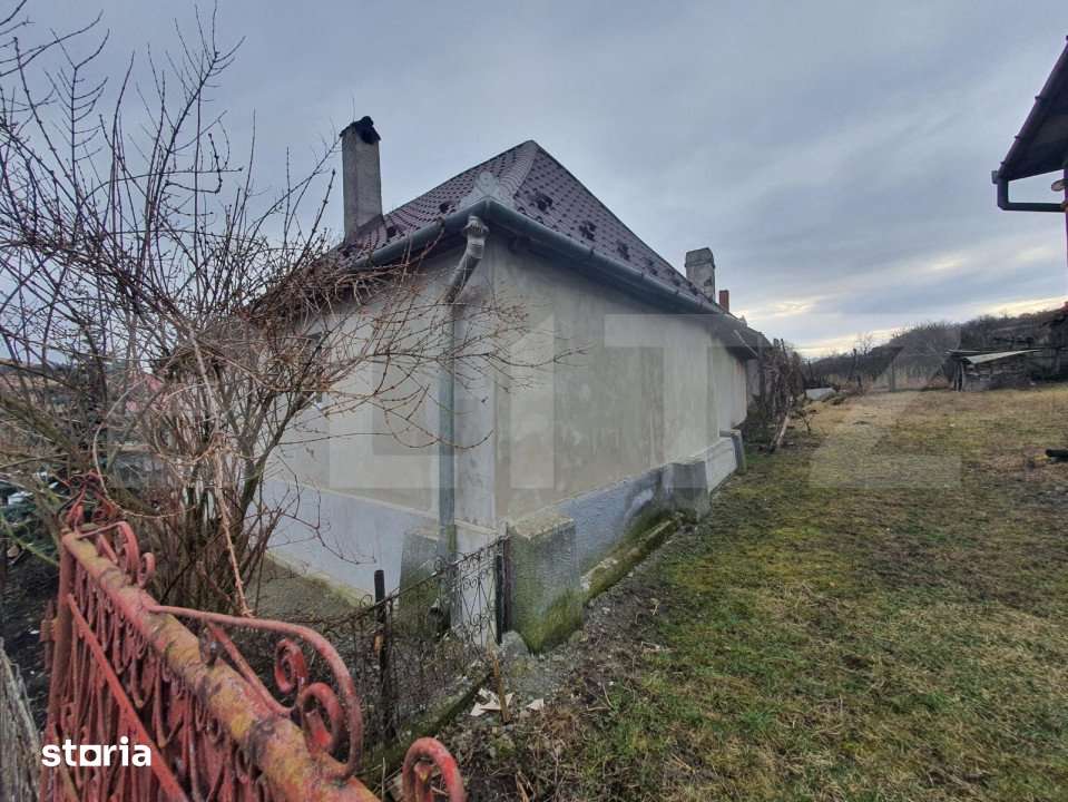 Casa individuala + 7,1 ha de teren dispersat, in Pinticu - Imagine principală: 5/9