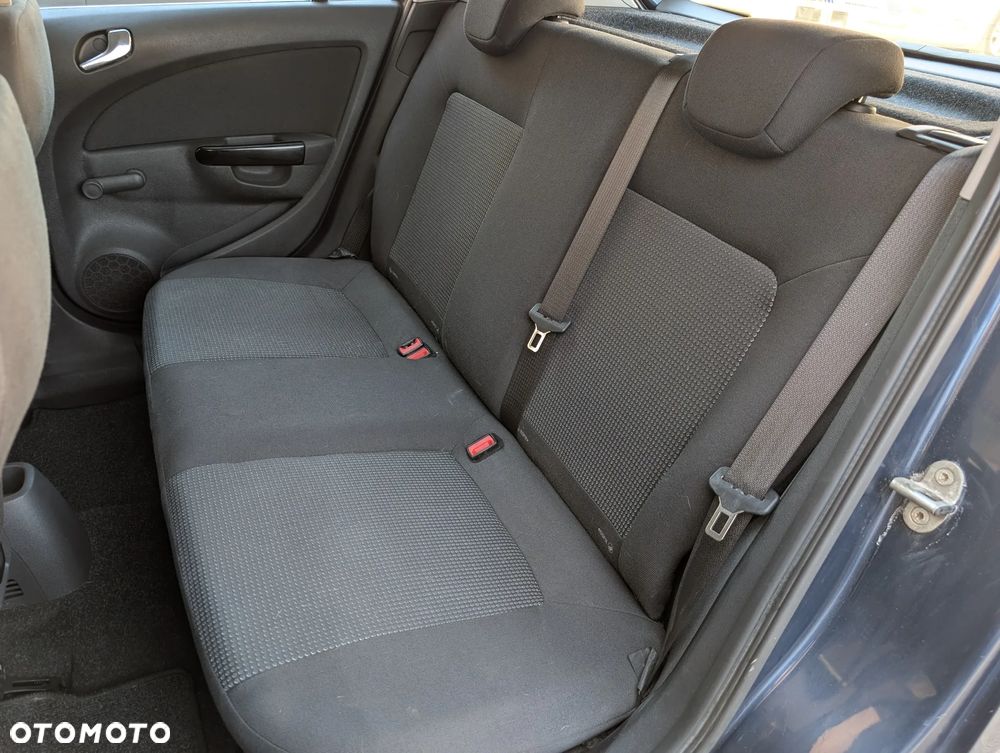 Opel Corsa 1.2 16V Enjoy - 25