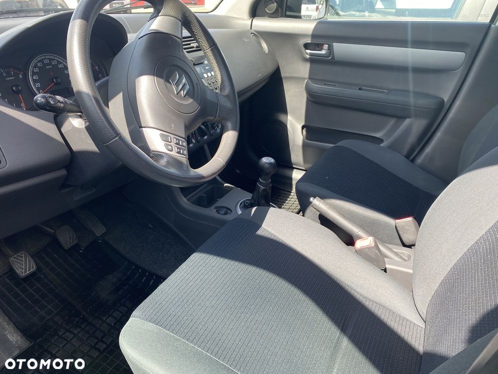 Suzuki Swift 1.3 Club - 12