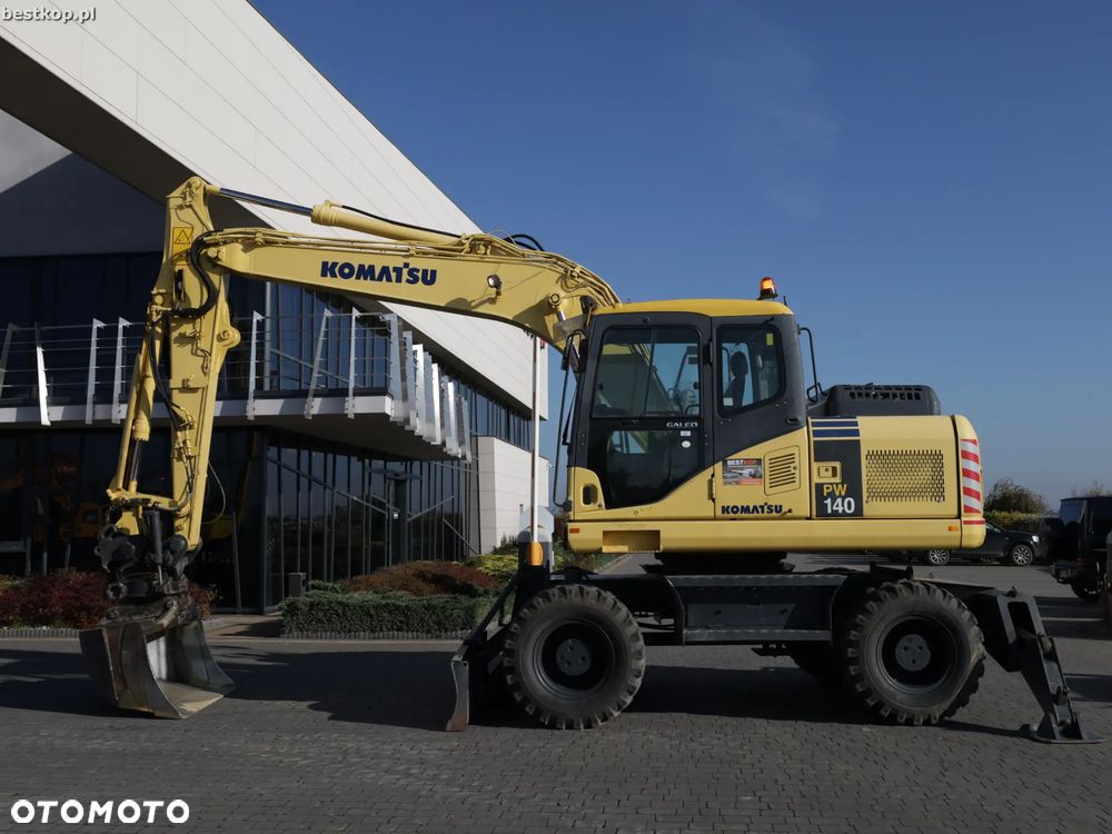 Komatsu PW140-7 - 11