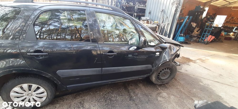 SUZUKI SX 4 SX4 FIAT SEDICI 1.9 DDIS Części Blacharskie i mechaniczne Szyba przód , Skrzynia biegów 79JA Napęd na przód Turbosprężarka 55205475 - 10