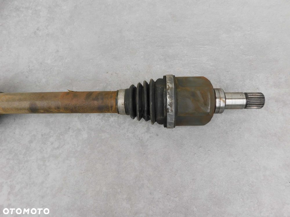 Półoś lewa kompletna z podporą Peugeot Partner Citroen Berlingo 1.6 - 3