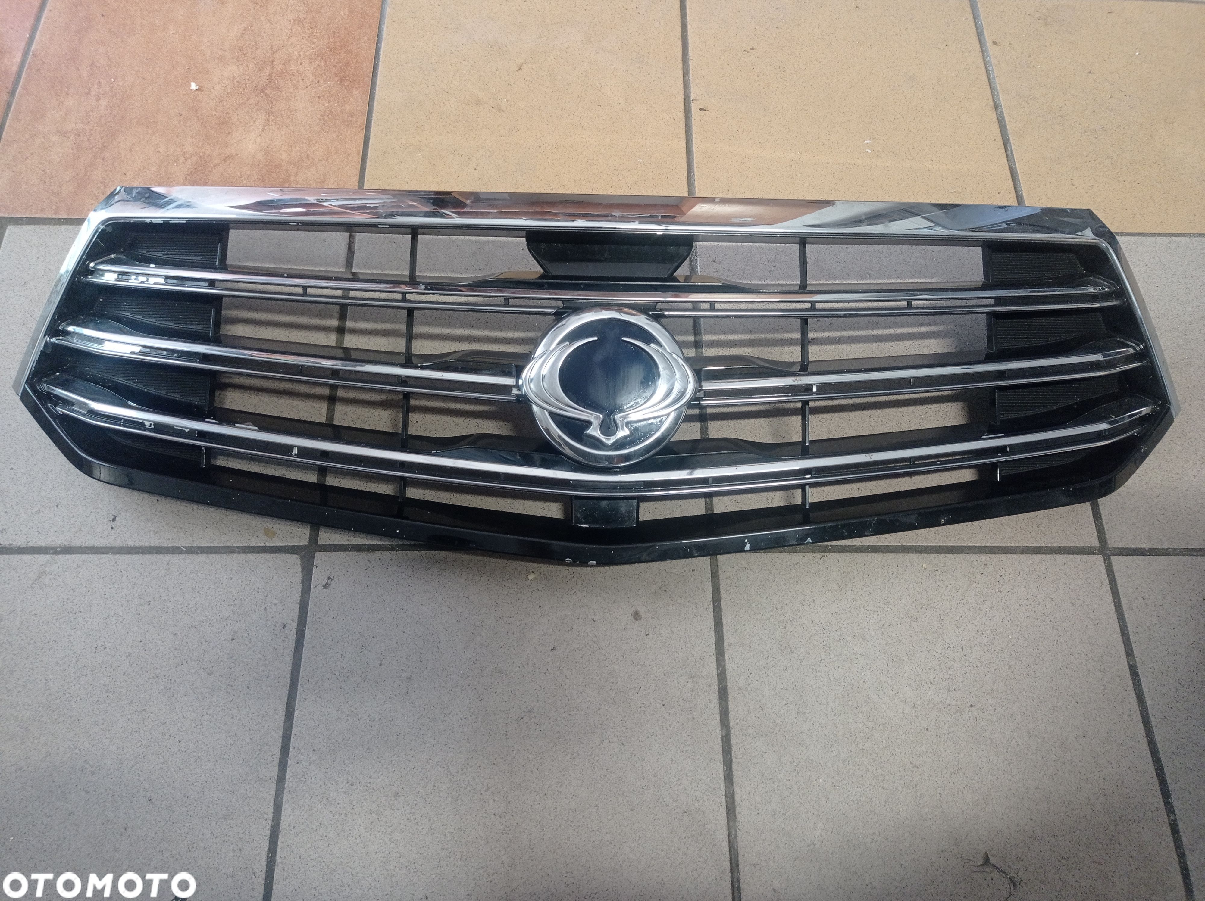 SSANGYONG KORANDO 2013- GRILL ATRAPA PRZÓD 79411-21600 - 1
