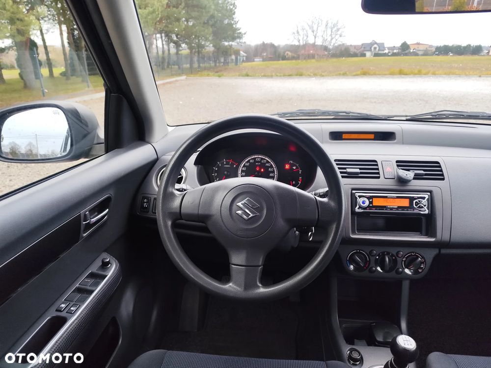 Suzuki Swift 1.3 GLX - 8