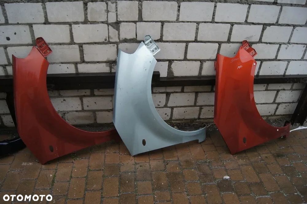 SUZUKI SX4 06-12 BŁOTNIK PRZEDNI PRAWY - 1