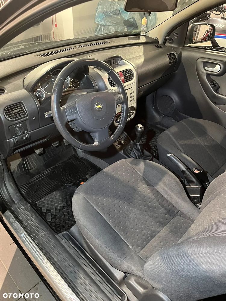 Opel Corsa 1.2 16V Enjoy - 5