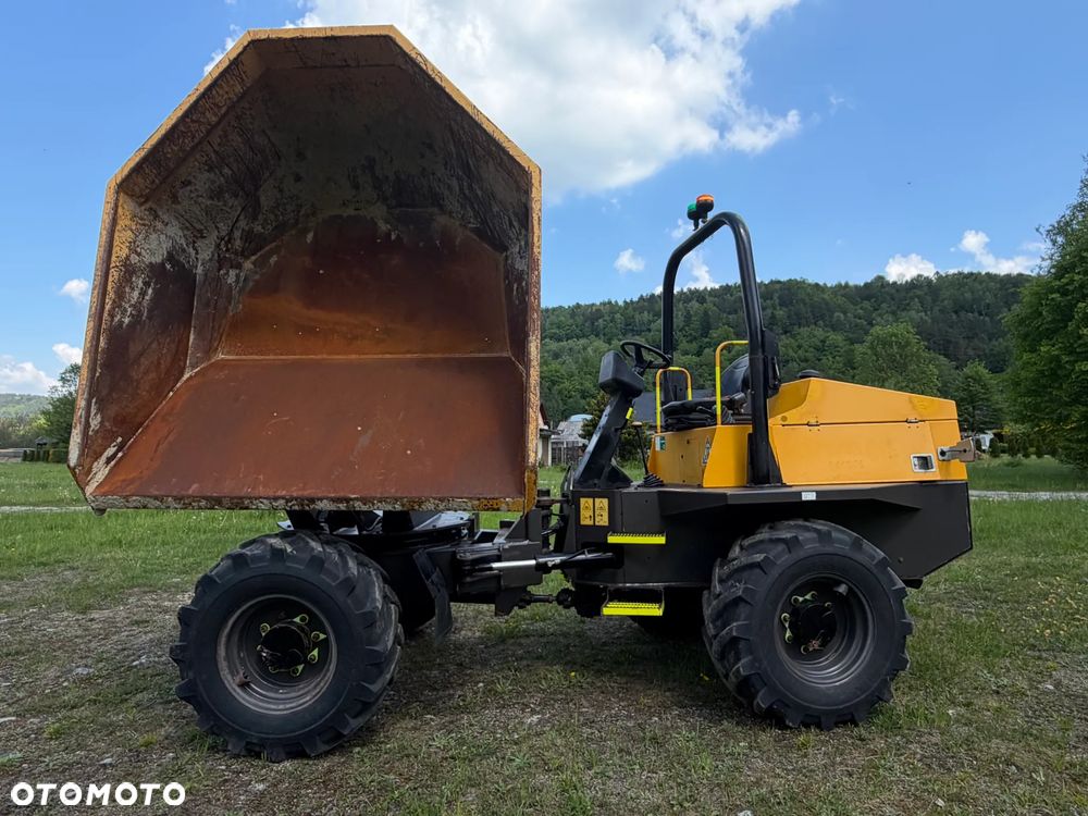 Terex Mecalac TA6s Wozidło wózek z Obrotową Kolebą. 6 ton ładowność. 4x4. Silnik Perkins. 4 cylindry. 808 mtg. 2022 rok. Kamera z wielkim Ekranem! Jazda Rewers 3prędkości. Maszyna jak Nowa z Norweskiego Gospodarstwa! Ani deka luzów i wycieków! Hydrostatic. Pełny Oryginał. Hamulce brzytwa. Serwisy w DEKRA. Maszyna Woziła lekkie ładunki. Praktycznie zerowe zużycie. Wielka Okazja. Wszystko w pełnym Oryginale. Opony Oryginał wszystkie jak Nowe. Komendy Głosowe w maszynie! - 29