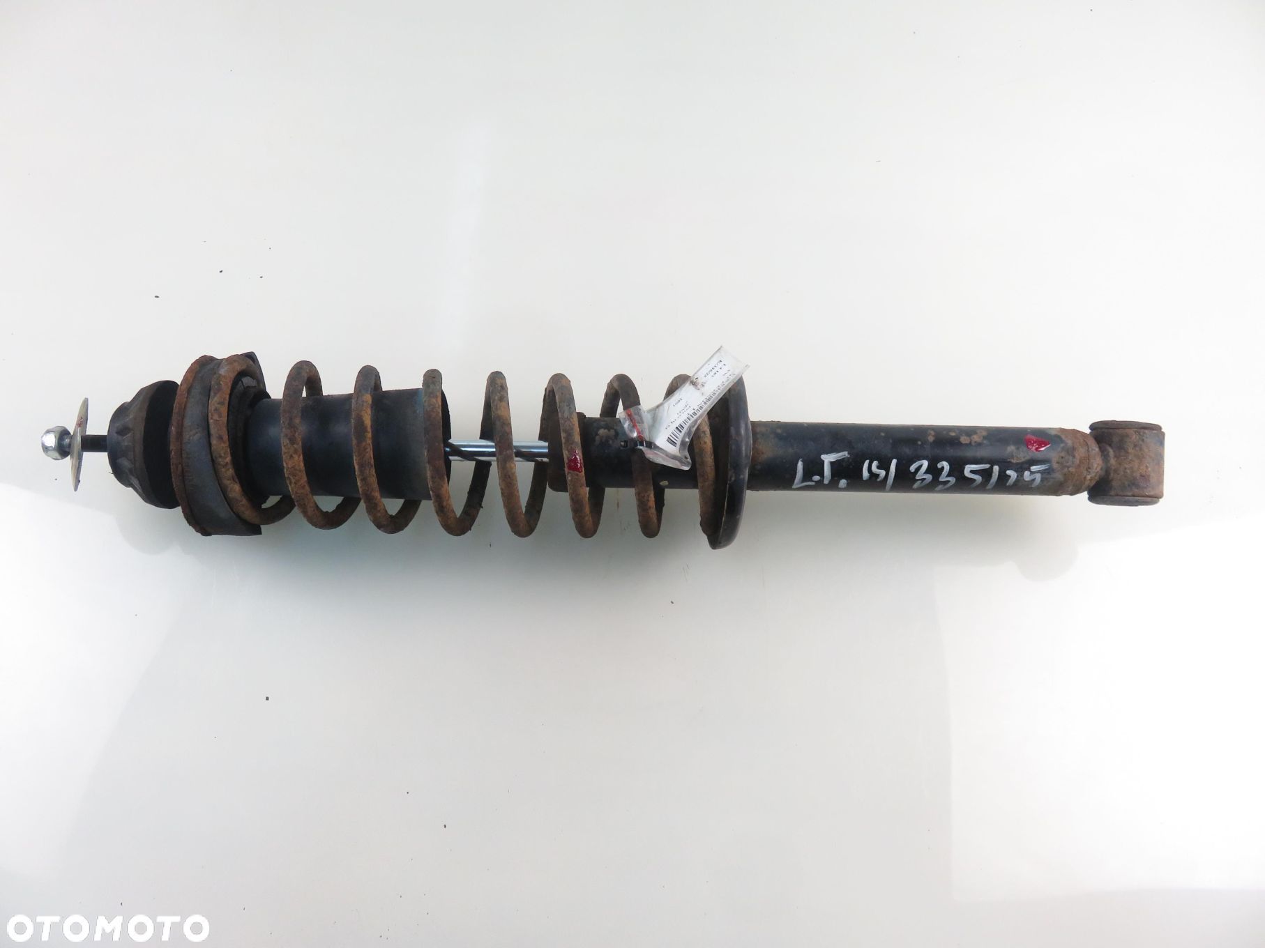 AMORTYZATOR LEWY TYLNY VW POLO III lift 1.4 16V - 1