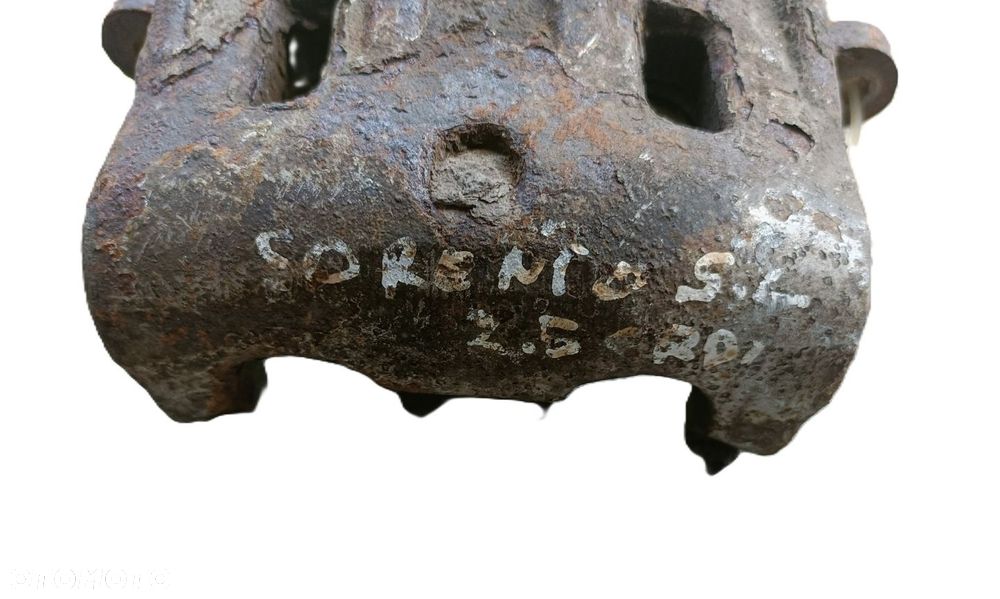 KIA SORENTO I 2,5 CRDI 02-09 r. ZACISK HAMULCOWY LEWY PRZÓD + - 2