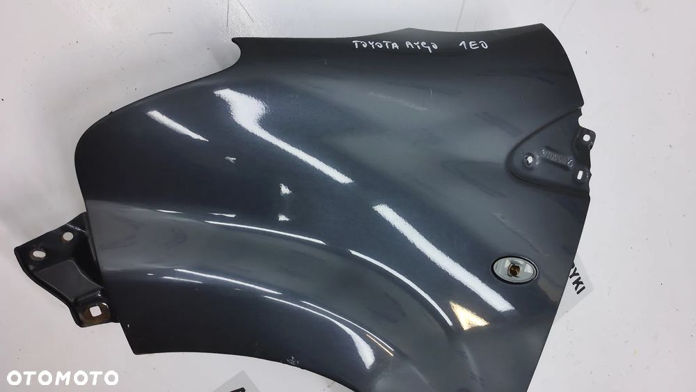 Toyota Aygo I Błotnik  Lewy 1E0 - 2