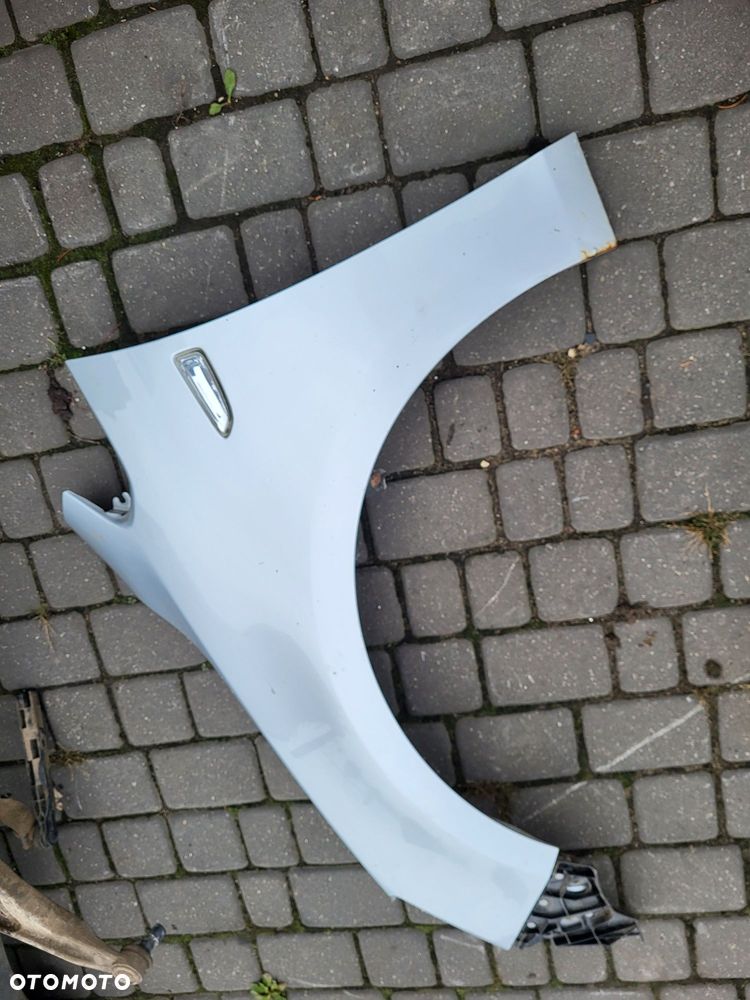 Błotnik przedni lewy opel astra j z 11r lakier z 176 - 4