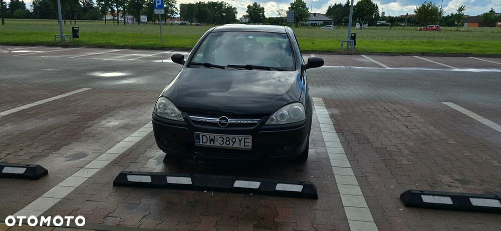 Opel Corsa 1.2 16V Cosmo - 1