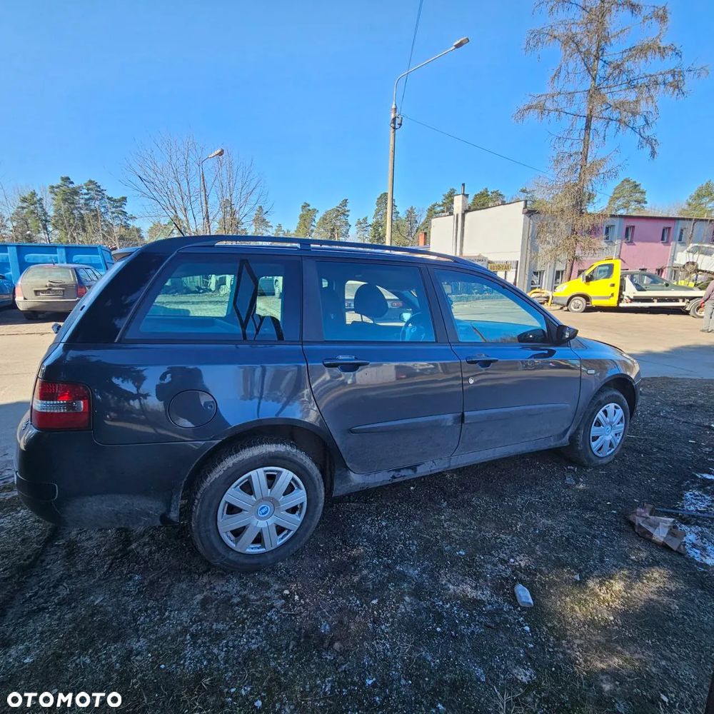 Fiat Stilo 1,6 B 76 kW / 103 KM (2003 kombi) (kod lak: 675) pojazd na części: maska, zderzak, drzwi, szyby, lusterka, chłodnica ... - 27
