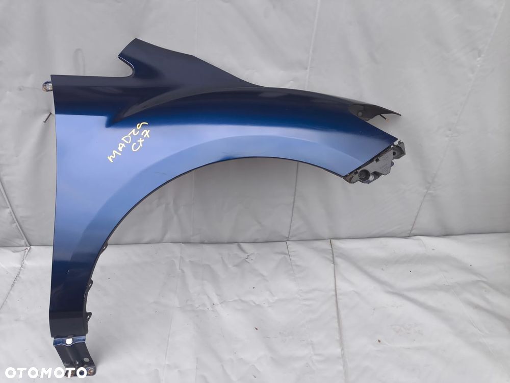 MAZDA CX7 CX-7 BŁOTNIK PRAWY PRZEDNI