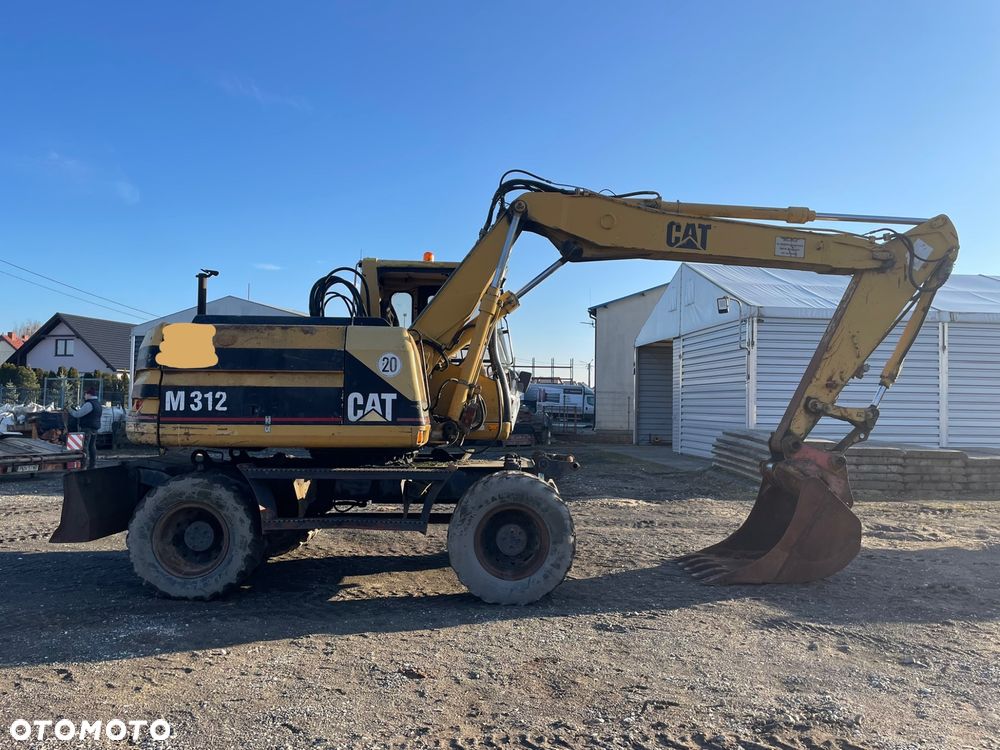 Caterpillar M312 - 6