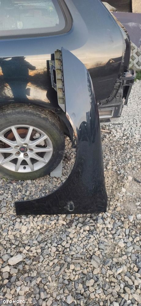 KL BŁOTNIK LEWY PRZÓD SAAB 9-3 SS 03- 298 CZARNA - 1