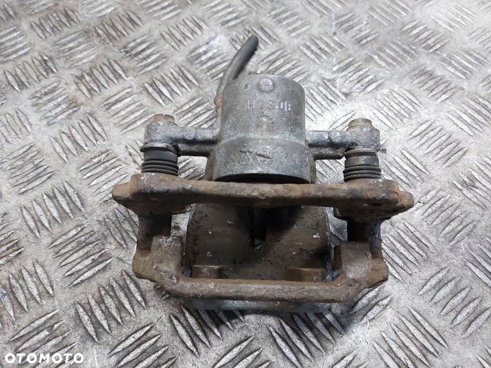 ZACISK HAMULCOWY PRAWY TYŁ TOYOTA AVENSIS T25 - 3