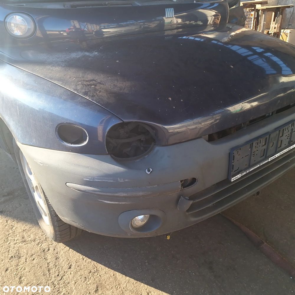 MASKA ZDERZAK DRZWI BLOTNIK LAMPY SZYBA CZESCI MULTIPLA 339/7 - 10