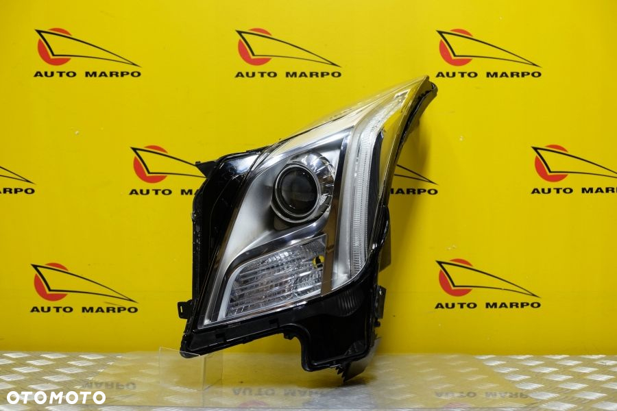 CADILLAC XTS 2013- REFLEKTOR LAMPA LEWA XENON USA - 2