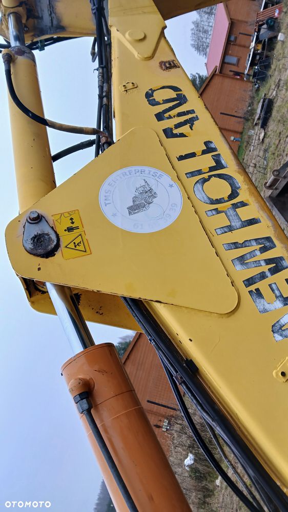 New Holland LB 115 - 38