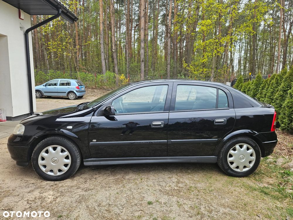 Opel Astra 1.4 - 7