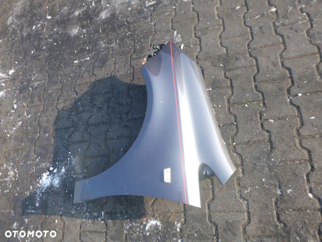 BŁOTNIK LEWY PRZÓD LEWY PRZEDNI OPEL CORSA D Z168 - 9
