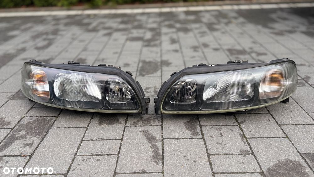 Lampa Volvo S60 lewa prawa lampy reflektor przód 89006822 89006821 Valeo 86559611 lewy prawy