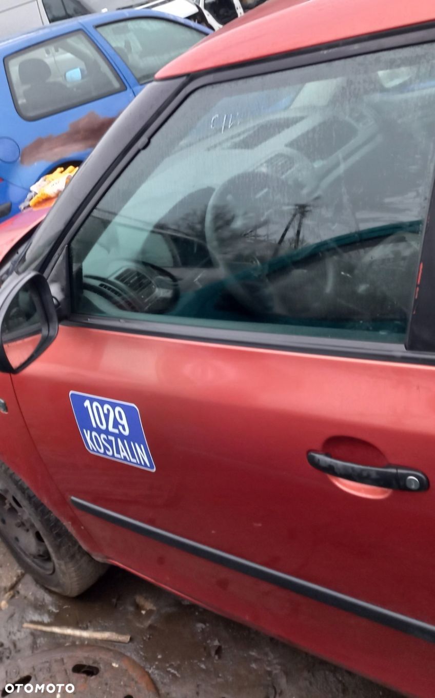 DRZWI PRZEDNIE LEWE SKODA FABIA II - 1