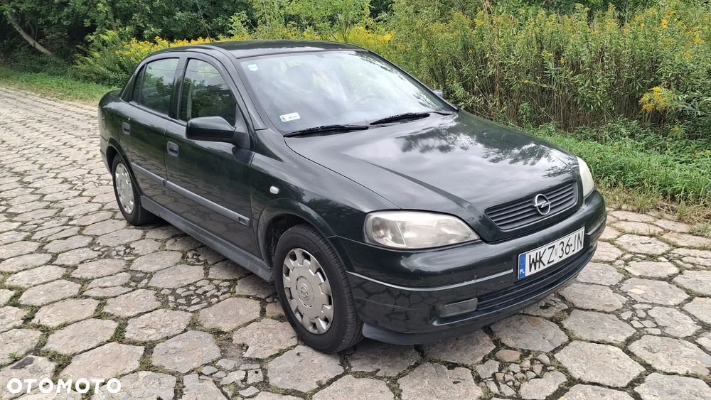 Na części Opel Astra G II SEDAN silnik 1.6 X16XEL Z16XE lakier Z380 skrzynia maska zderzak drzwi klapa szyba fotel kanapa lusterko lampa deska GWARANCJA !!! Przód Tył Zestaw Komplet Drzwi Klapa Zderzak Błotnik Maska Grill Atrapa Szyba Pas Lampa Lusterko Boczki Fotel Kanapa Kokpit Deska Rozdzielcza Przełącznik Włącznik Sterownik Przewody Wiązka Instalacja Moduł Komputer Czujnik Listwa Pompa Alternator Wtryski Głowica Rozrusznik Kompresor Sprzęgło Dwumas Silnik  Skrzynia ABS Klimatyzacji Paliwa Wspomagania Kolektor Turbina Przepustnica Zawór Chłodnica Koło Hak Belka Sanki Zawieszenie Mcpherson Półoś Amortyzator Wydech Tłumik Zacisk Most - 2